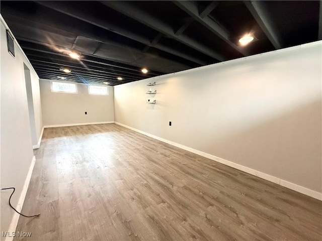 21571 Ball Ave, Euclid, OH 44123 - below grade area featuring wood finished floors and baseboards