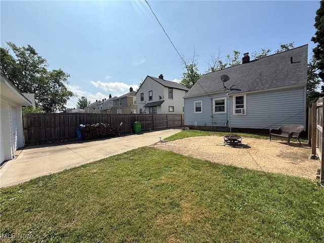 21571 Ball Ave, Euclid, OH 44123 - view of yard with a patio and an outdoor fire pit