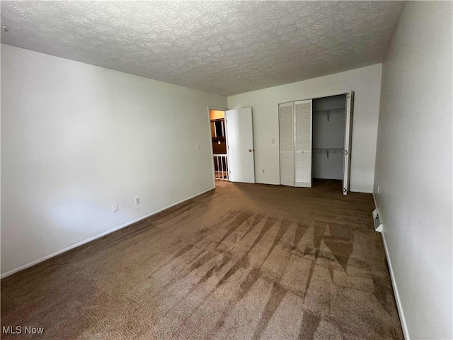 35049 N Turtle Trl Unit C, Willoughby, OH 44094 - unfurnished bedroom with carpet flooring, a textured ceiling, and a closet