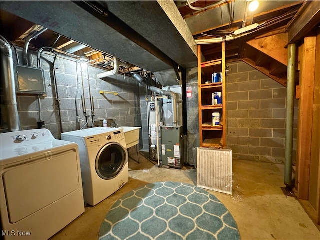 35049 N Turtle Trl Unit C, Willoughby, OH 44094 - washroom with washing machine and dryer, heating unit, and water heater