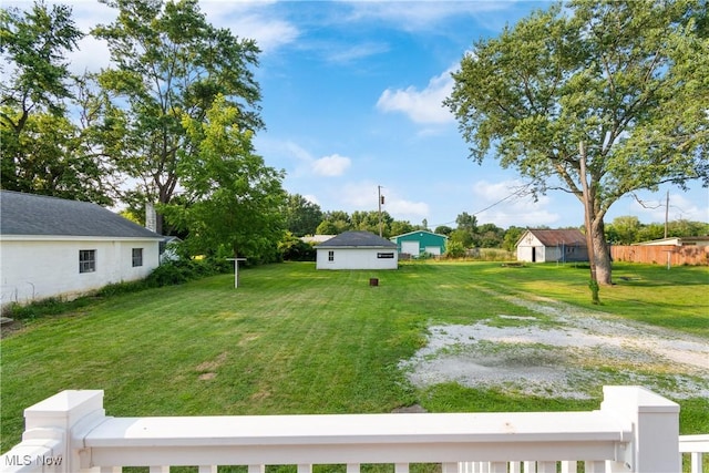 115 Coulter St, Creston, OH 44217 - view of green lawn with driveway