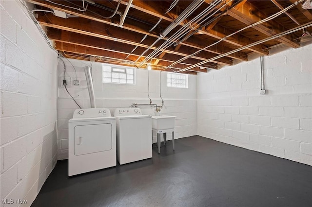 1835 Rockefeller Rd, Wickliffe, OH 44092 - washroom with washer and dryer and concrete block wall