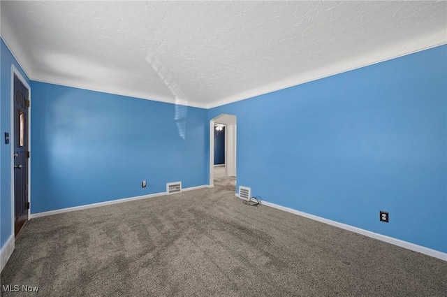 1835 Rockefeller Rd, Wickliffe, OH 44092 - carpeted spare room with a textured ceiling and baseboards