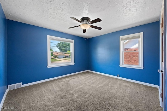 1835 Rockefeller Rd, Wickliffe, OH 44092 - carpeted empty room featuring ceiling fan and a textured ceiling