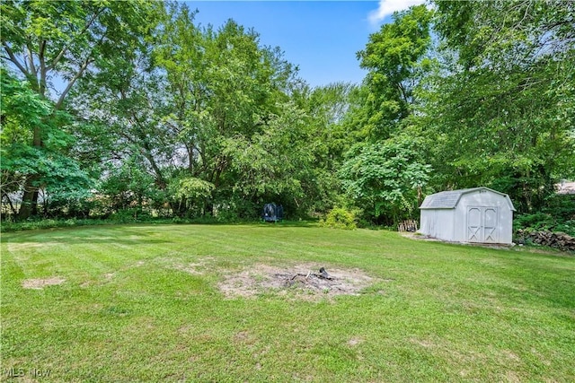 6170 Oberlin Rd, Amherst, OH 44001 - view of grassy yard featuring a storage unit