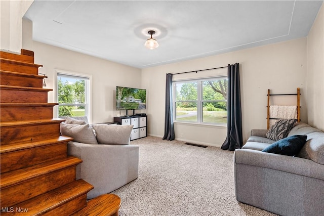 6170 Oberlin Rd, Amherst, OH 44001 - living room featuring stairway and carpet