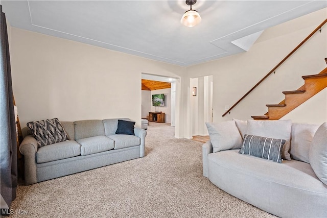 6170 Oberlin Rd, Amherst, OH 44001 - carpeted living area featuring stairs