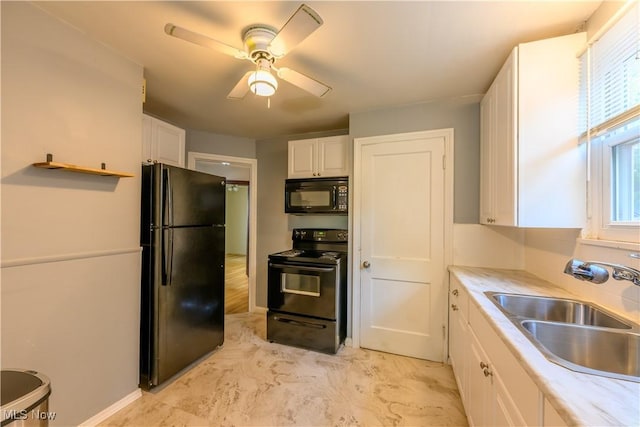 19005 Pawnee Ave, Cleveland, OH 44119 - kitchen featuring black appliances, white cabinets, light countertops, and ceiling fan
