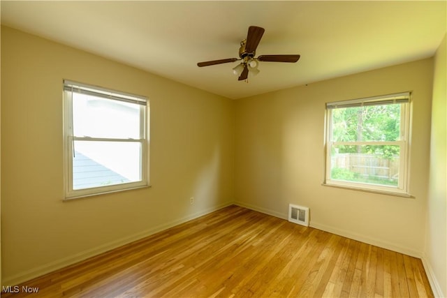 19005 Pawnee Ave, Cleveland, OH 44119 - unfurnished room with light wood-style floors and a ceiling fan