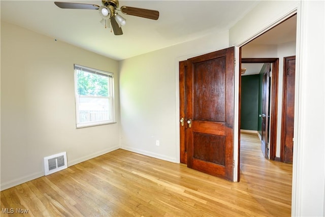 19005 Pawnee Ave, Cleveland, OH 44119 - unfurnished bedroom featuring light wood-style flooring and ceiling fan
