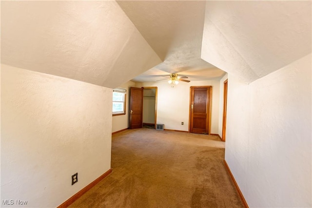 19005 Pawnee Ave, Cleveland, OH 44119 - additional living space with a ceiling fan, vaulted ceiling, and light carpet
