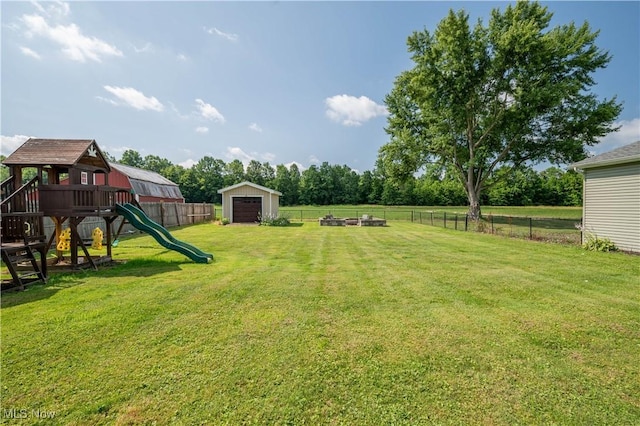 2835 Hallock Young Rd SW, Warren, OH 44481 - fenced backyard featuring a playground