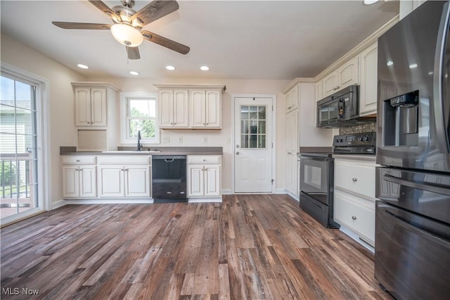 2835 Hallock Young Rd SW, Warren, OH 44481 - kitchen with black appliances, dark wood-type flooring, ceiling fan, and recessed lighting