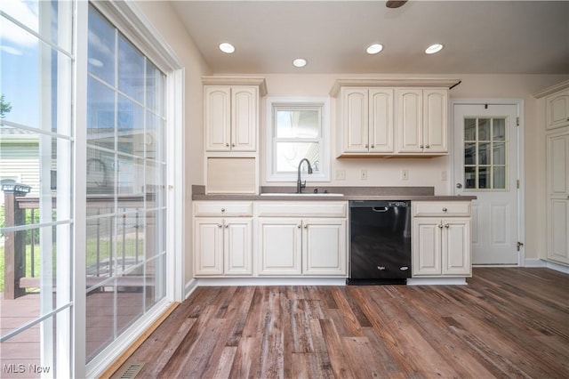 2835 Hallock Young Rd SW, Warren, OH 44481 - kitchen with black dishwasher, dark wood-style flooring, plenty of natural light, recessed lighting, and white cabinets