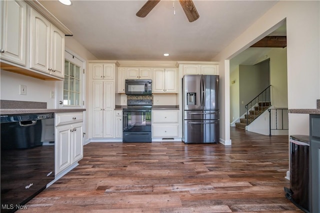 2835 Hallock Young Rd SW, Warren, OH 44481 - kitchen featuring black appliances, a ceiling fan, dark wood-style floors, dark countertops, and recessed lighting
