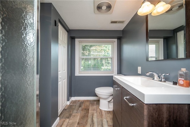 2835 Hallock Young Rd SW, Warren, OH 44481 - bathroom featuring wood finished floors and vanity