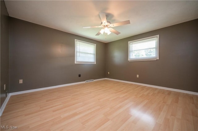 2835 Hallock Young Rd SW, Warren, OH 44481 - empty room featuring light wood-style floors and ceiling fan