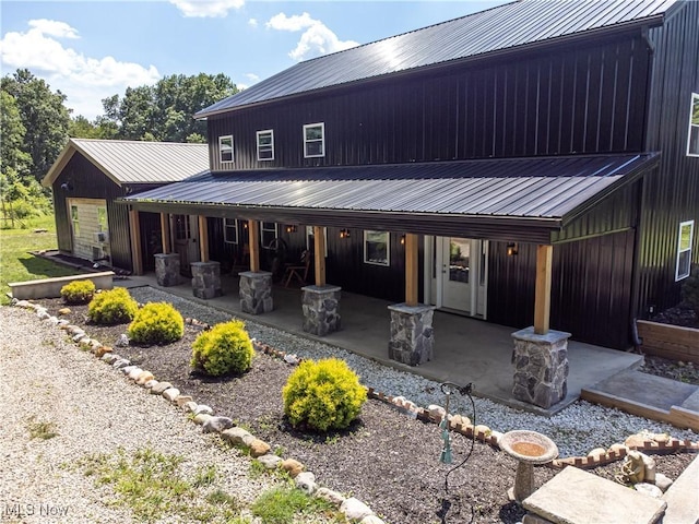 10770 W W Salem Rd, West Salem, OH 44287 - back of property featuring a metal roof and a porch