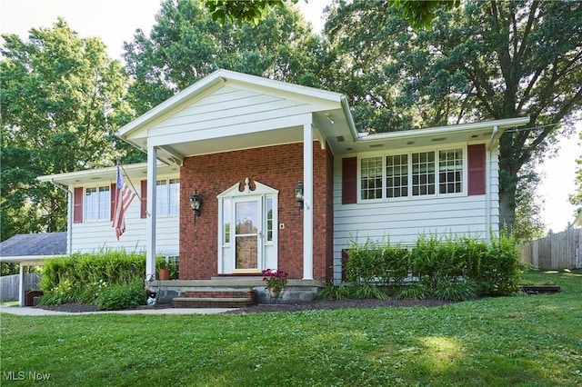 2948 Robin Hill Ln, Mogadore, OH 44260 - view of front facade with brick siding