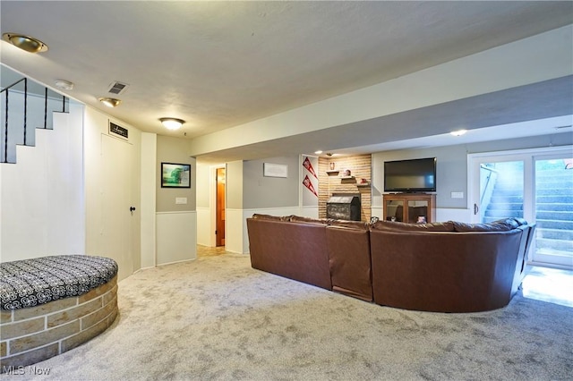 2948 Robin Hill Ln, Mogadore, OH 44260 - living area featuring stairway, a large fireplace, and carpet