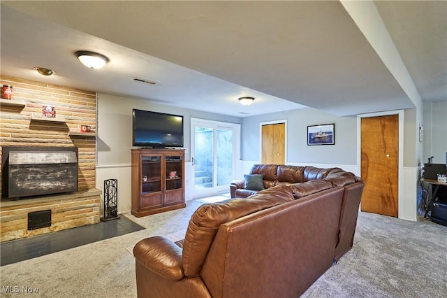 2948 Robin Hill Ln, Mogadore, OH 44260 - carpeted living area with a stone fireplace