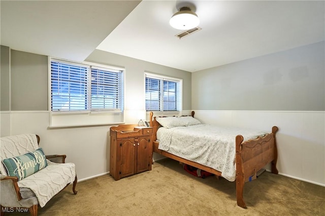 2948 Robin Hill Ln, Mogadore, OH 44260 - bedroom featuring light colored carpet and wainscoting