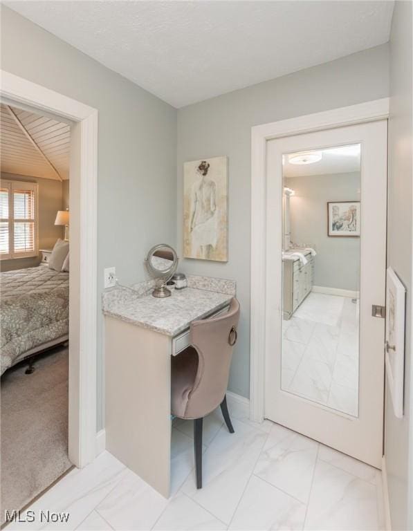 6252 Pebblebrook Ln, North Olmsted, OH 44070 - ensuite bathroom with marble finish flooring and baseboards