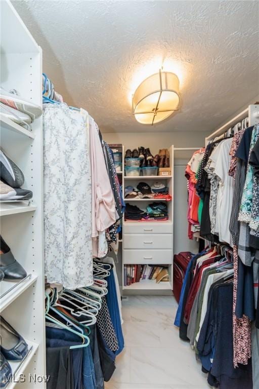 6252 Pebblebrook Ln, North Olmsted, OH 44070 - spacious closet with marble look tiles