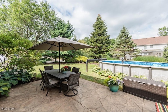 6252 Pebblebrook Ln, North Olmsted, OH 44070 - view of patio / terrace featuring an outdoor pool and outdoor dining area