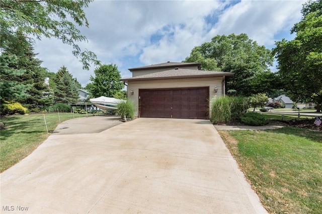 6252 Pebblebrook Ln, North Olmsted, OH 44070 - view of property exterior with a lawn, concrete driveway, and an attached garage