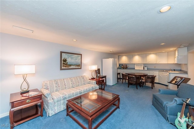 6252 Pebblebrook Ln, North Olmsted, OH 44070 - carpeted living room featuring recessed lighting and a sink