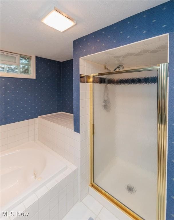 6252 Pebblebrook Ln, North Olmsted, OH 44070 - full bath with a shower stall, a garden tub, wallpapered walls, and tile patterned floors