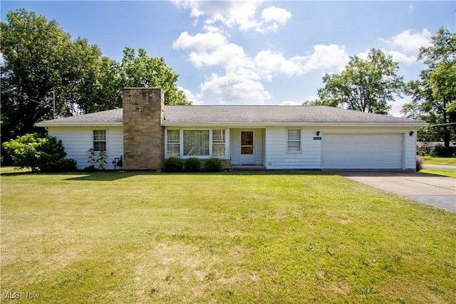 2456 Batdorf Rd, Wooster, OH 44691 - ranch-style home featuring an attached garage, concrete driveway, a chimney, and a front lawn