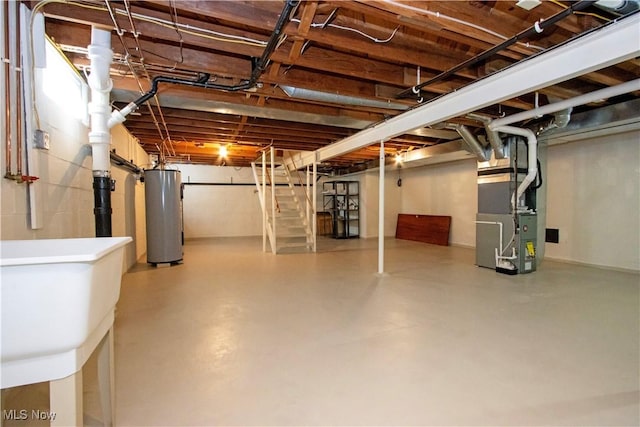 2456 Batdorf Rd, Wooster, OH 44691 - unfinished basement with water heater, heating unit, and stairway