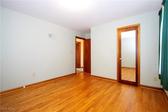 2456 Batdorf Rd, Wooster, OH 44691 - empty room featuring light wood-type flooring and baseboards