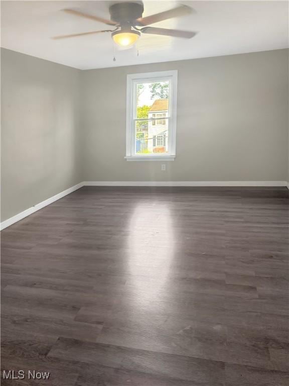 1209 Courtland Rd, Weirton, WV 26062 - spare room featuring dark wood-type flooring and a ceiling fan