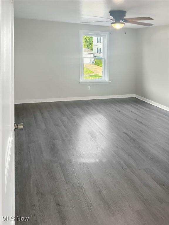 1209 Courtland Rd, Weirton, WV 26062 - unfurnished room with dark wood-style floors and a ceiling fan