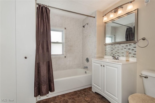2129 E 41st St, Ashtabula, OH 44004 - bathroom featuring shower / tub combo, vanity, backsplash, and tile patterned flooring