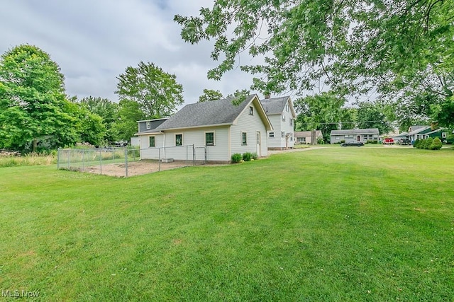 2129 E 41st St, Ashtabula, OH 44004 - rear view of property with a shingled roof