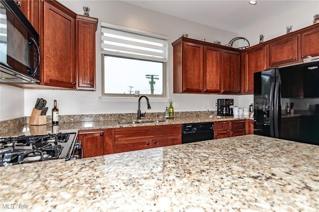 12591 Larchmere Blvd Unit W-6, Cleveland, OH 44120 - kitchen with black appliances and light stone counters