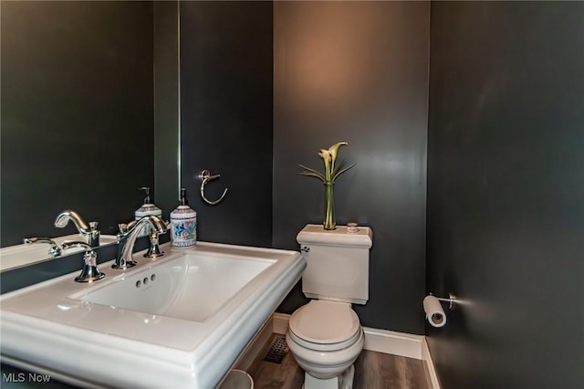 12591 Larchmere Blvd Unit W-6, Cleveland, OH 44120 - bathroom with baseboards and wood finished floors