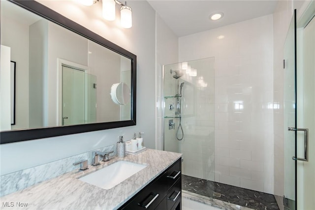 12591 Larchmere Blvd Unit W-6, Cleveland, OH 44120 - bathroom featuring walk in shower, vanity, and recessed lighting