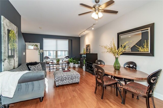 12591 Larchmere Blvd Unit W-6, Cleveland, OH 44120 - dining room featuring wood finished floors, a ceiling fan, and track lighting