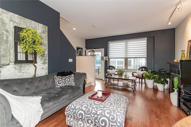 12591 Larchmere Blvd Unit W-6, Cleveland, OH 44120 - living room featuring wood finished floors, stairs, and an accent wall