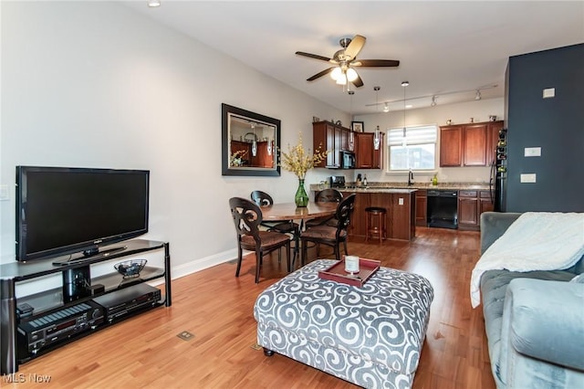 12591 Larchmere Blvd Unit W-6, Cleveland, OH 44120 - living room with a ceiling fan, wood finished floors, and track lighting