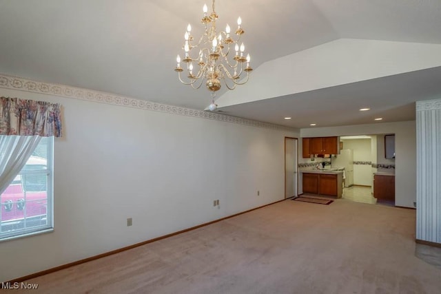 4039 Tannybrooke Ln NW Unit C, Canton, OH 44718 - unfurnished living room with light carpet, a chandelier, lofted ceiling, and recessed lighting