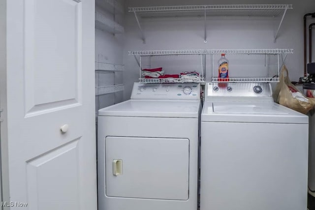 4039 Tannybrooke Ln NW Unit C, Canton, OH 44718 - laundry area with washer and clothes dryer