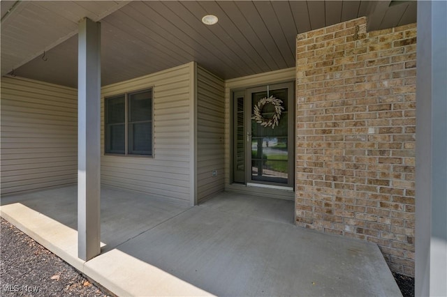 230 Clingan Rd, Struthers, OH 44471 - view of exterior entry with brick siding