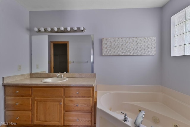 230 Clingan Rd, Struthers, OH 44471 - full bath featuring a tub with jets and vanity