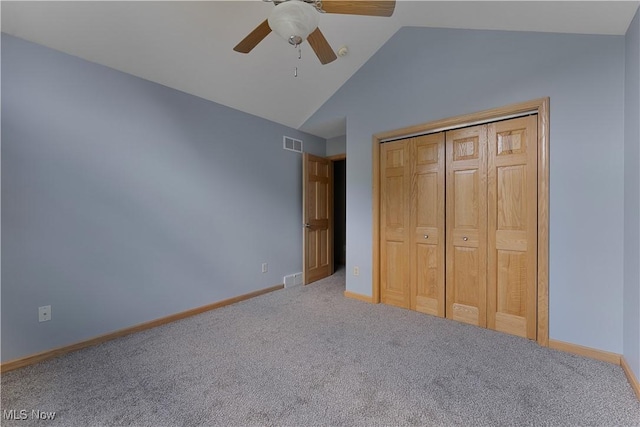 230 Clingan Rd, Struthers, OH 44471 - unfurnished bedroom with carpet flooring, vaulted ceiling, a closet, and a ceiling fan